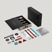 Coffret Intégral Moonshine : capsule, trois flacons de 30 ml, cartes d'embarquement et stickers
